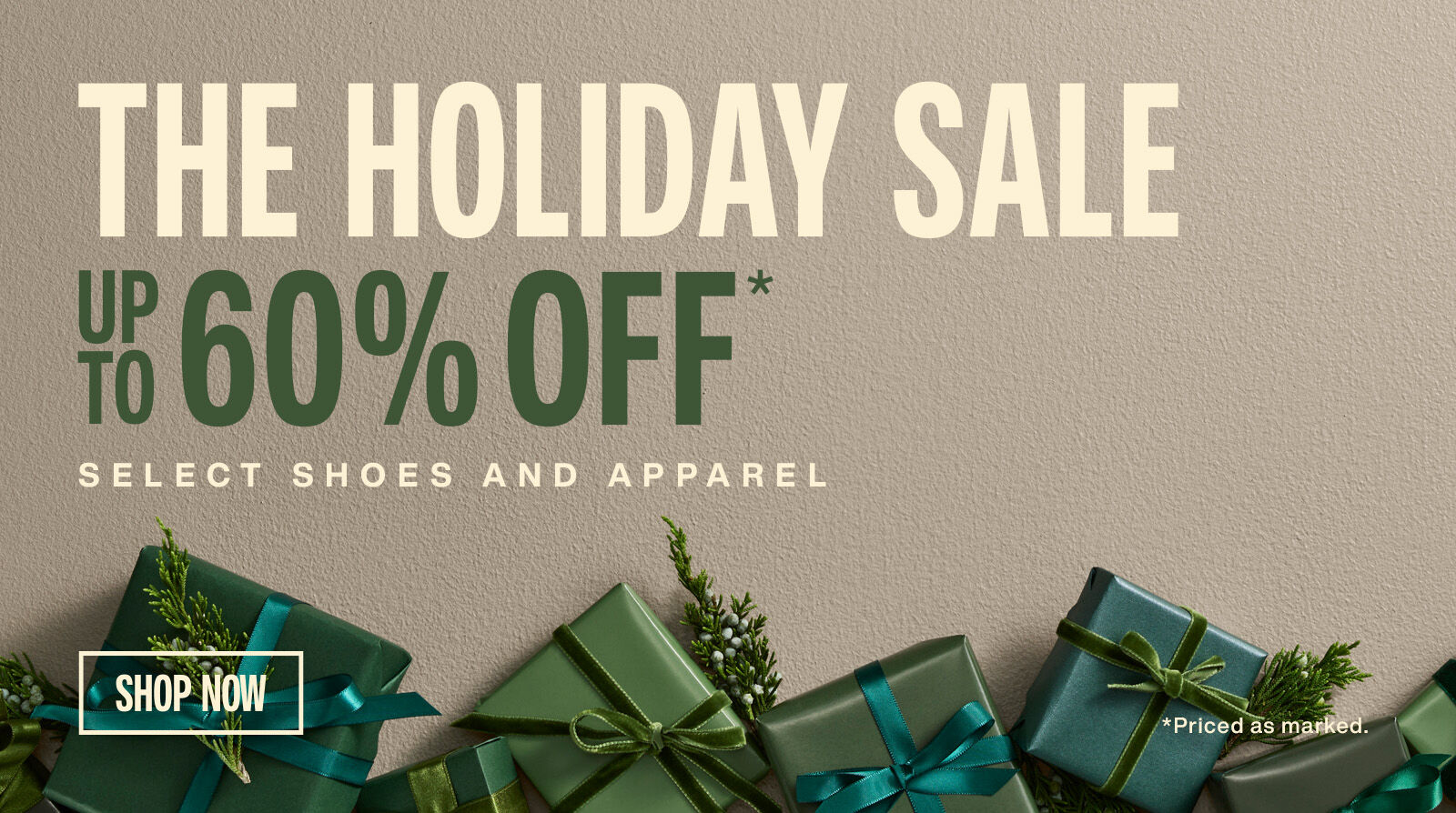 Green holiday decor and presents with text that says The Holiday Sale, Up to 60% Off.